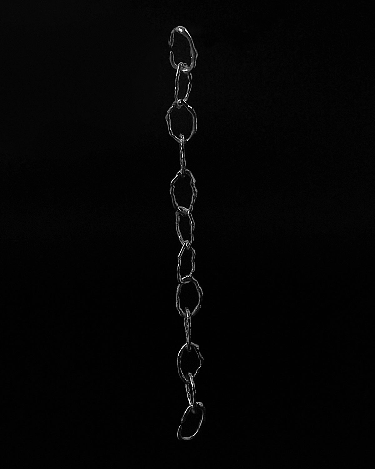 Minimal silver bracelet with smooth flowing links